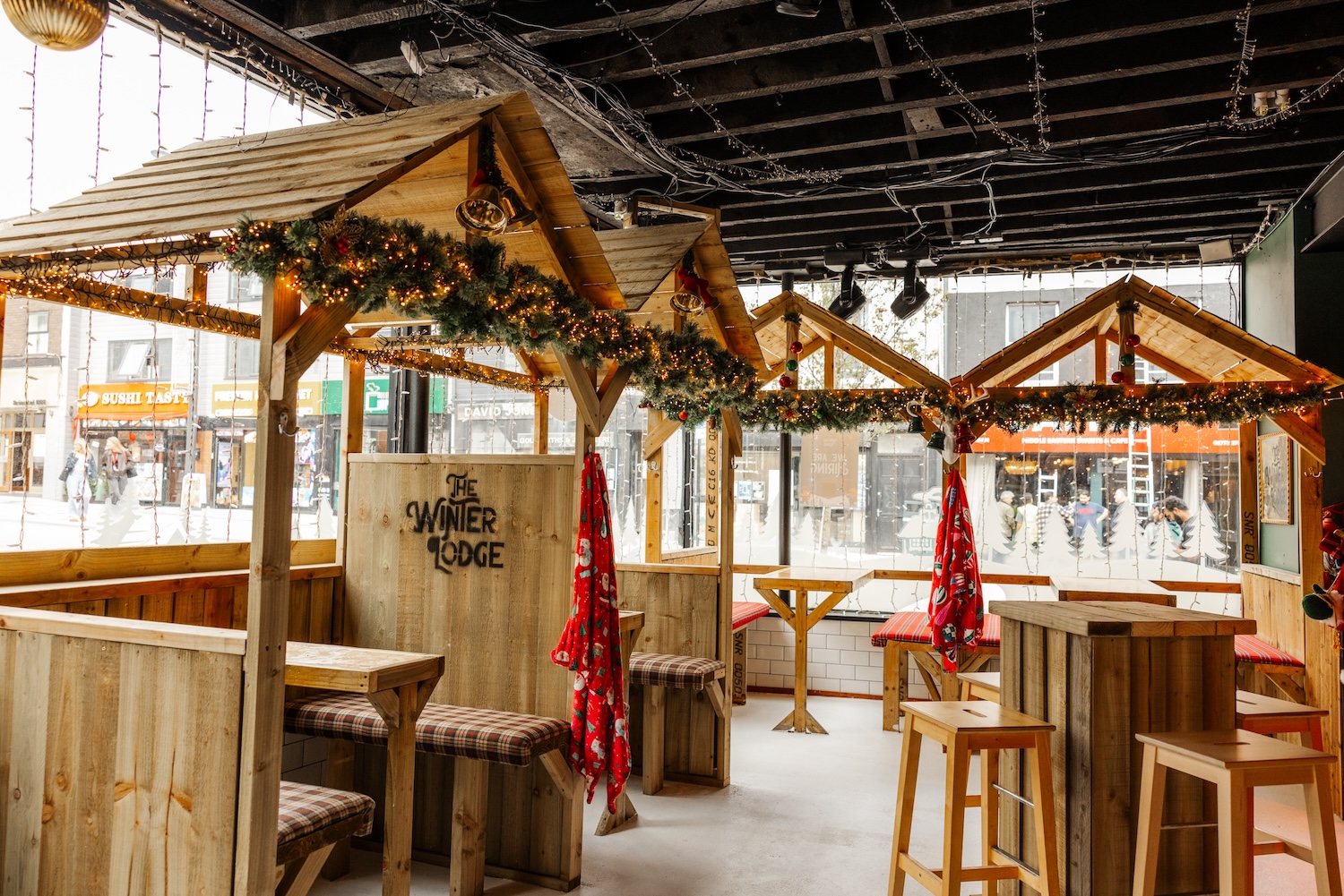 Wooden huts by the window looking onto Friargate